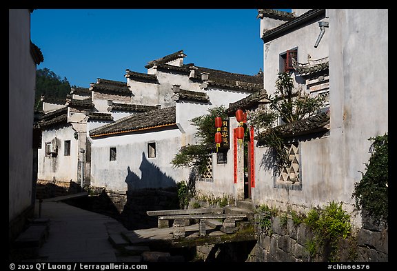 Street with bridges over stream. Xidi Village, Anhui, China (color)