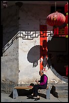 Elderly woman eating. Xidi Village, Anhui, China ( color)