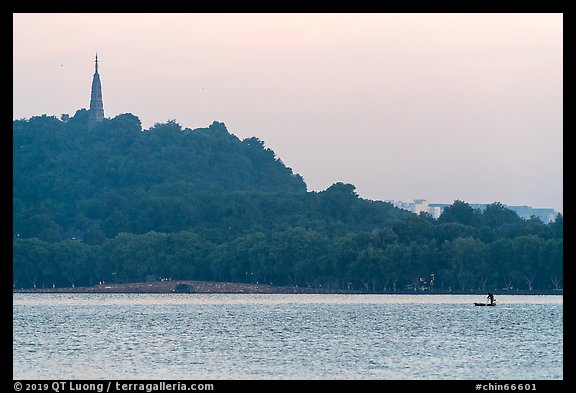 Boat and Baochu Pagoda at sunrise, West Lake. Hangzhou, China (color)