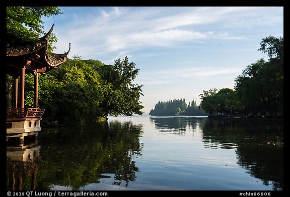 Tree-lined shores and pavilion, West Lake. Hangzhou, China