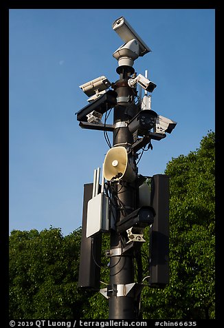 Surveillance cameras and speakers, the Bund. Shanghai, China (color)