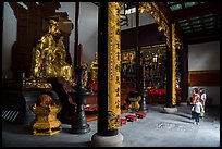 Family visiting Dajing Taoist temple. Shanghai, China ( color)