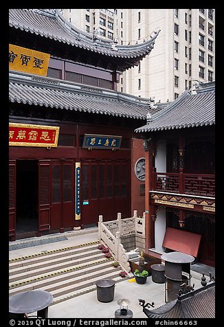 Dajing Taoist temple and modern buildings. Shanghai, China (color)
