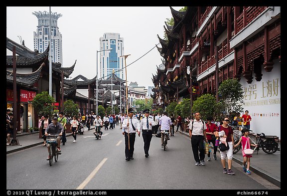 Fangbang Middle Road touristified old streets and modern towers. Shanghai, China (color)