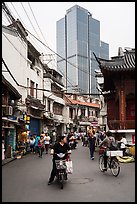 Old street and modern tower. Shanghai, China ( color)