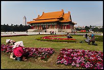 Grounds of Chiang Kai-shek memorial with workers and tourists. Taipei, Taiwan (color)
