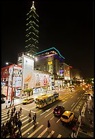 Shopping district street at night and Taipei 101. Taipei, Taiwan (color)