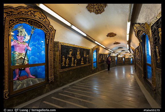 100 meter tunnel lined with brightly painted deities, Guandu Temple. Taipei, Taiwan (color)