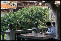 Man reading, Guandu Temple. Taipei, Taiwan (color)