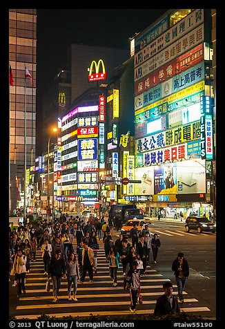 Pedestrian crossing by night and neon signs. Taipei, Taiwan (color)