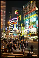 Pedestrian crossing by night and neon signs. Taipei, Taiwan ( color)