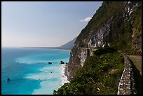 Road atop steep see cliffs overlooking ocean. Taroko National Park, Taiwan ( color)