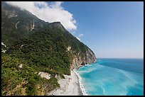 Lush mountains drop into azure ocean. Taroko National Park, Taiwan ( color)