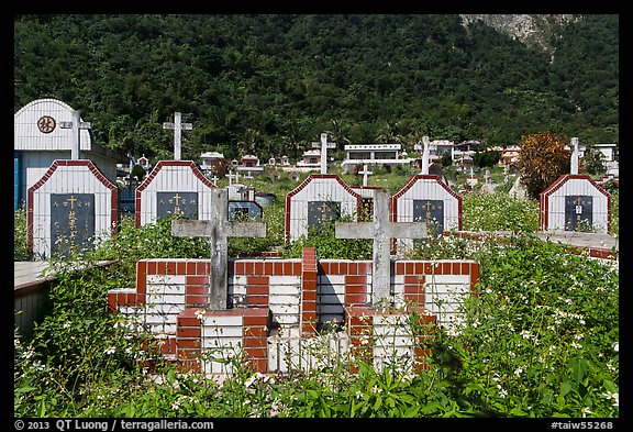 Tombs below lush cliff, Chongde. Taiwan (color)