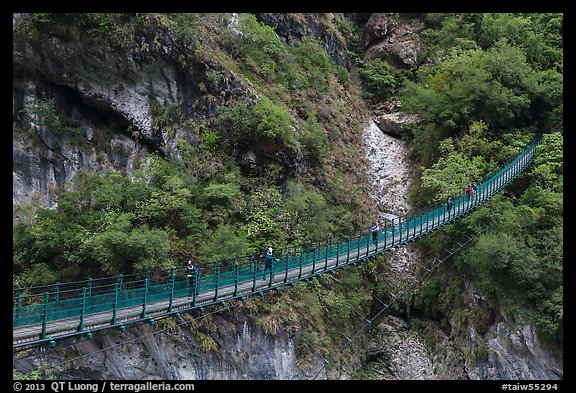 Suspension bridge with hikers. Taroko National Park, Taiwan (color)