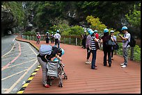 Tourists wearing park-provided helmets for safety. Taroko National Park, Taiwan ( color)