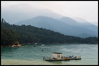 Houseboats and misty mountains. Sun Moon Lake, Taiwan (color)