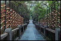 Stairs to temple lined up with blessing wind chimes. Sun Moon Lake, Taiwan (color)