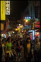 People on main street at night, Shueishe Village. Sun Moon Lake, Taiwan (color)