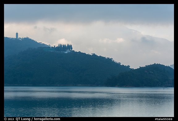 Shabalan Mountain ridge in mist with Syuanzang Temple and Tsen Pagoda. Sun Moon Lake, Taiwan (color)