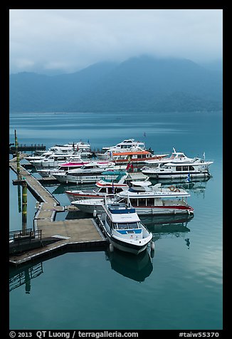 Tour boats in early morning. Sun Moon Lake, Taiwan (color)