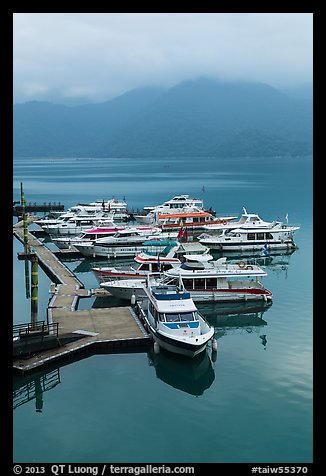 Tour boats in early morning. Sun Moon Lake, Taiwan (color)