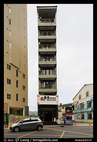 Tall and thin hotel building. Sun Moon Lake, Taiwan (color)
