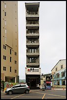 Tall and thin hotel building. Sun Moon Lake, Taiwan (color)