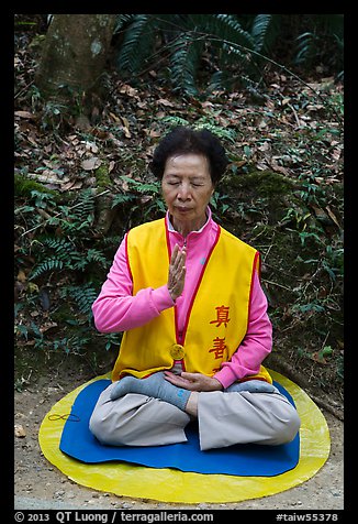 Woman meditating. Sun Moon Lake, Taiwan (color)