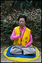 Woman meditating. Sun Moon Lake, Taiwan (color)