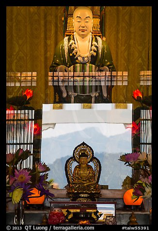 Buddha statues and reflections. Sun Moon Lake, Taiwan