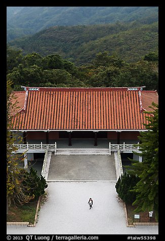 Woman and temple from above, Tsen Pagoda. Sun Moon Lake, Taiwan