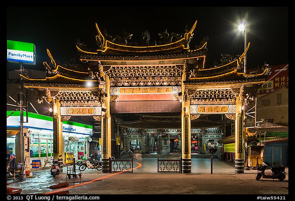 Temple gate and convenience store at night, Matzu Temple. Lukang, Taiwan (color)