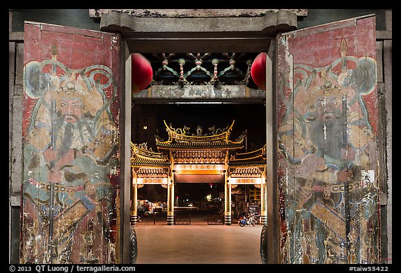 Painted doors, looking towards gate at night, Tienhou Temple. Lukang, Taiwan (color)