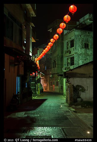 Red paper lanterns glowing in  Nine-turns lane at night. Lukang, Taiwan (color)