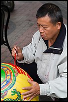 Man painting paper lantern. Lukang, Taiwan ( color)
