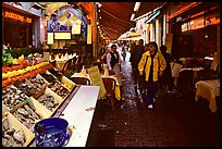 Rue des Bouchers, a narrow cobbled street lined with restaurants. Brussels, Belgium (color)