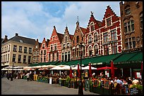 Restaurants and old houses on the Markt. Bruges, Belgium (color)