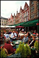 People in restaurants on the Markt. Bruges, Belgium (color)