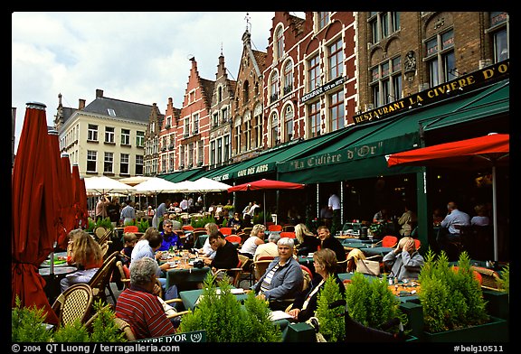 People in restaurants on the Markt. Bruges, Belgium (color)