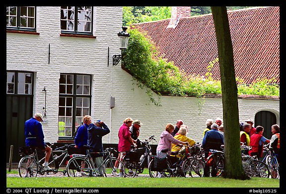 Bicylists in Courtyard of the Begijnhof. Bruges, Belgium (color)