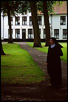 Benedictine nun in the Begijnhof. Bruges, Belgium ( color)