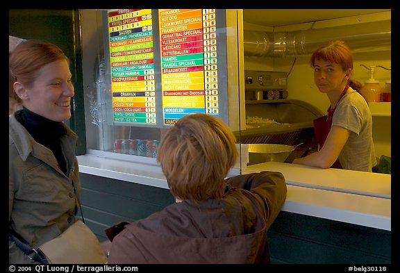 Women at a fries booth. Bruges, Belgium