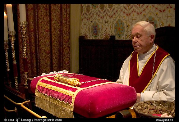 Priest and relic of Christ's blood. Bruges, Belgium
