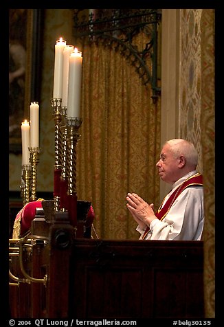 Priest in the the Basilica of Holy Blood. Bruges, Belgium (color)