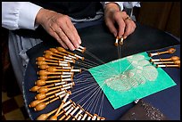 Lacemaker's hand at work. Bruges, Belgium (color)