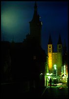 Rathaus and Neumunsterkirche seen fron Alte Mainbrucke (bridge) at night. Wurzburg, Bavaria, Germany