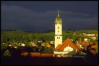 Nesselwang and St Andreas church, storm light. Bavaria, Germany