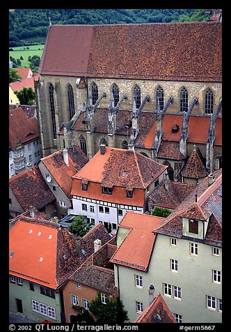 House rooftops and Kirche Sankt-Jakob seen from the Rathaus tower. Rothenburg ob der Tauber, Bavaria, Germany (color)