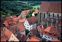 House rooftops and Kirche Sankt-Jakob seen from the Rathaus tower. Rothenburg ob der Tauber, Bavaria, Germany (color)
